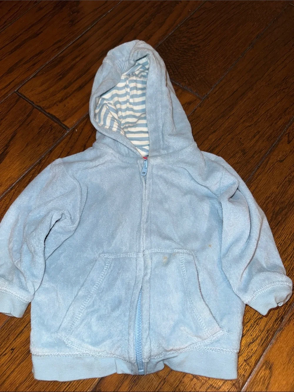 Baby Short-Sleeve One-Piece Bodysuit and a blue zipper sweater